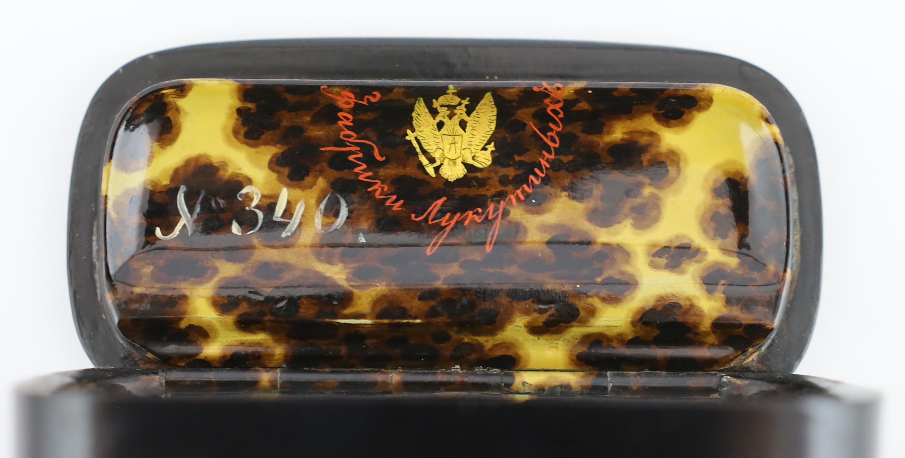 A fine Russian lacquer ‘Girl with admirers’ snuff box, by Lukutin, c.1840